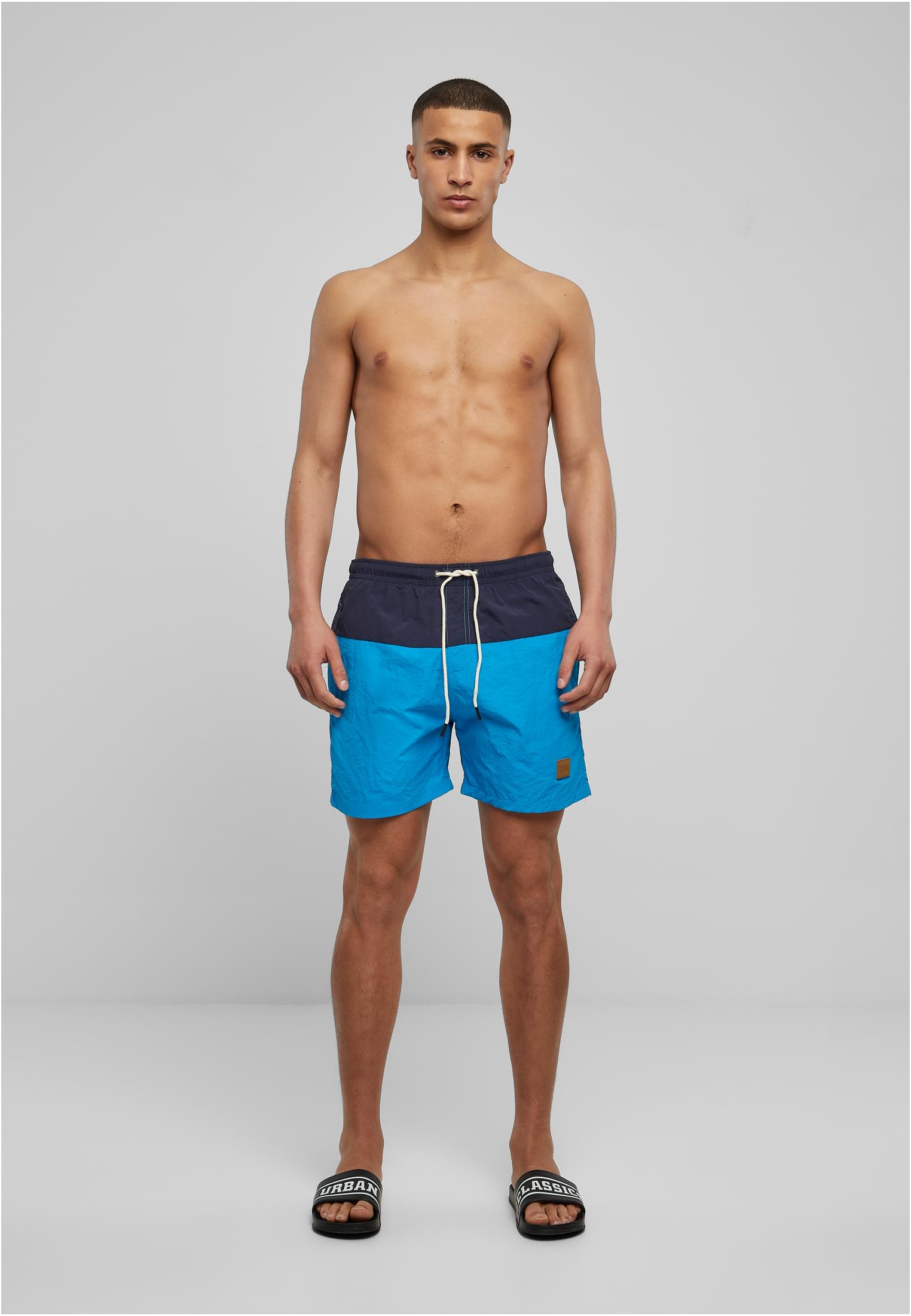 UC Men Pantaloncini Block Swim nvy/tur
